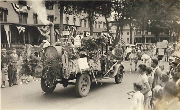 Old truck carrying paraders